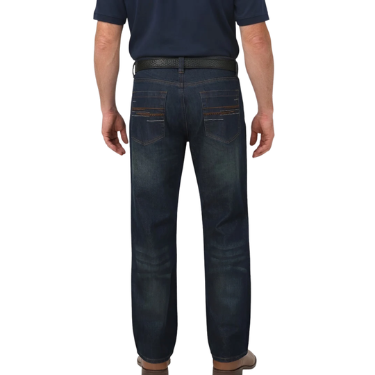 Rear view of a man wearing dark blue denim jeans with brown contrast stitching on the back pockets, paired with a black belt and a navy shirt, against a white background.