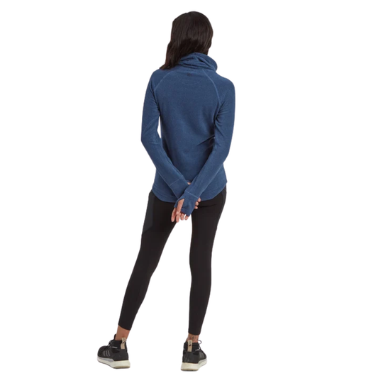 A woman shown from the back wearing a blue long-sleeve athletic cowl-neck top, black leggings, and black sneakers against a plain white background.