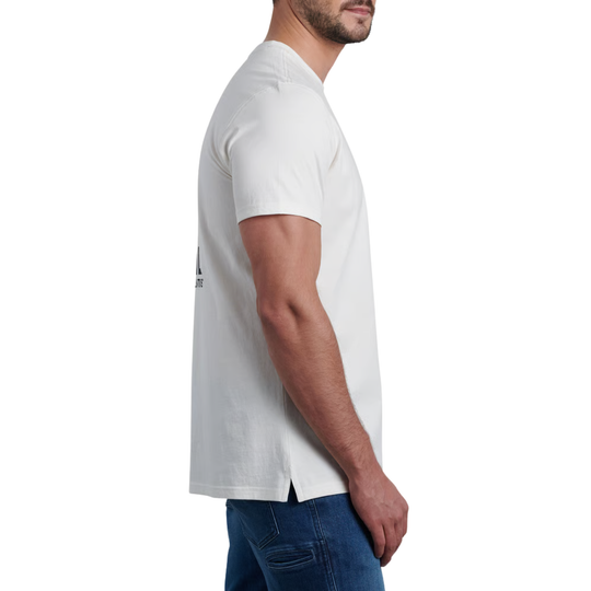 A man shown in side profile wearing a white short-sleeve crew-neck t-shirt and blue jeans against a plain white background.