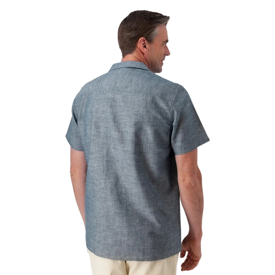 Man wearing a blue shirt on a white background