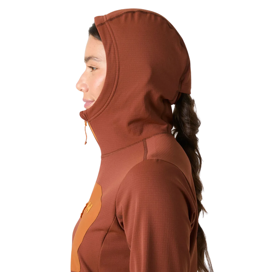 Person wearing a brown hooded outfit on a white background