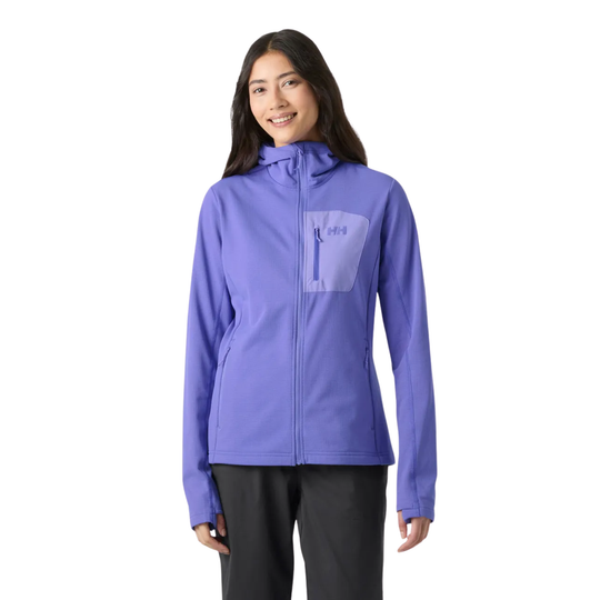 A woman modeling a purple hooded zip-up jacket with a tonal chest pocket, paired with black pants, against a plain white background.