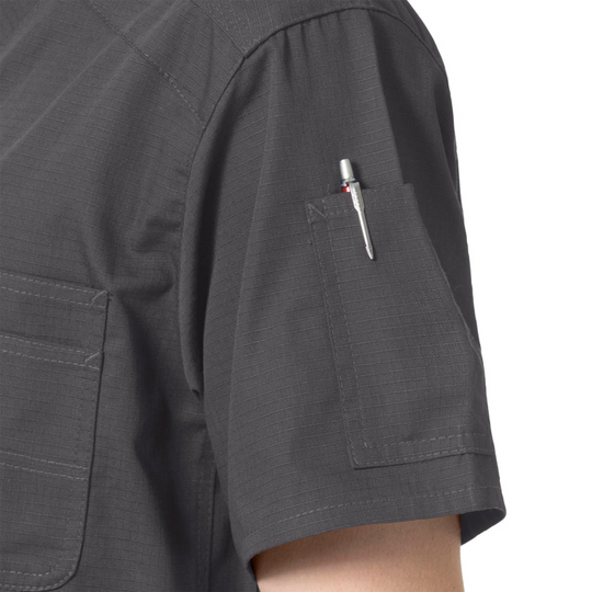 Dark charcoal short-sleeve scrub top with chest pocket and pen slot detail