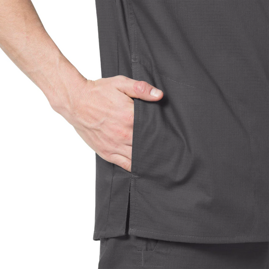 Dark gray scrub top with side pocket and side vent