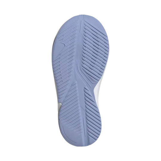 Light lavender-blue shoe outsole with diagonal tread grooves and a central textured channel