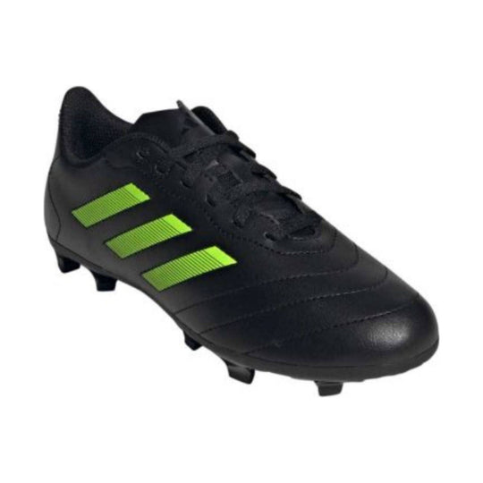 Black soccer cleat with neon green stripes and molded studs