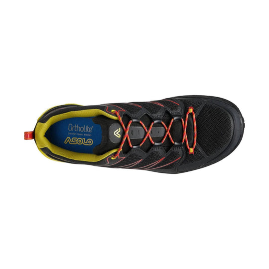 top view of Black and yellow hiking shoe with red accents on a white background