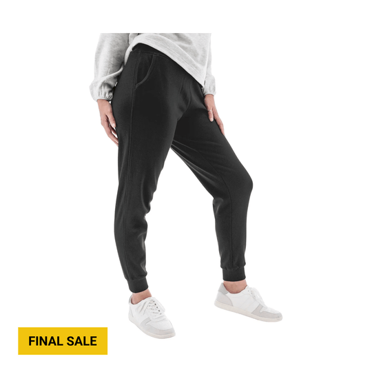 Black jogger pants on a model with ribbed cuffs and side pockets, with a FINAL SALE label