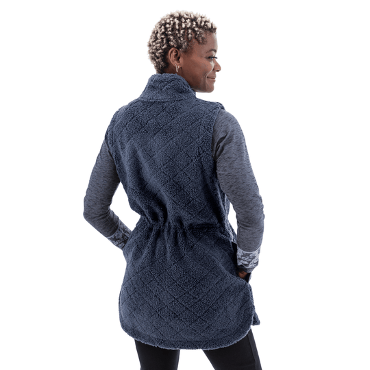 Navy textured fleece vest shown from the back over a gray long-sleeve top