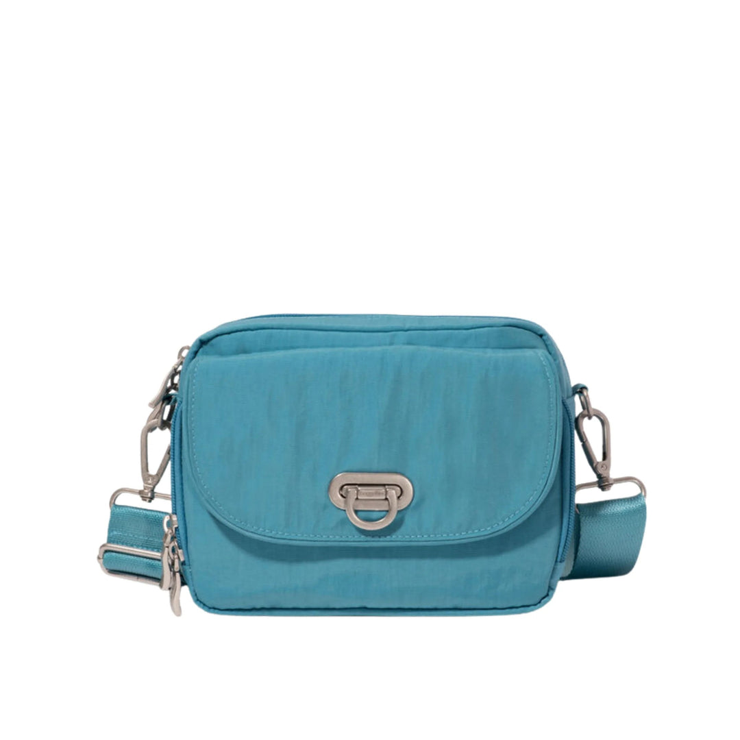 Blue crossbody camera bag with front flap pocket and adjustable strap