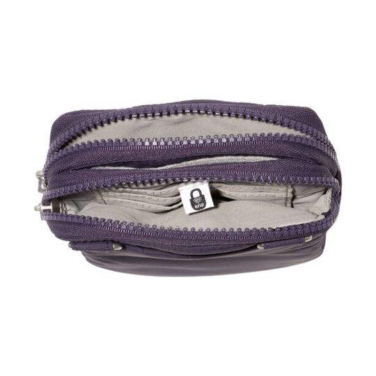 Purple zippered crossbody bag opened to show interior compartments and RFID tag