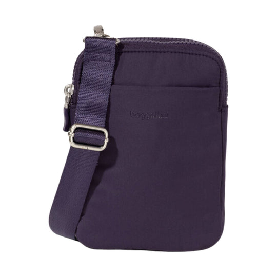 Purple crossbody pouch with adjustable strap and top zipper