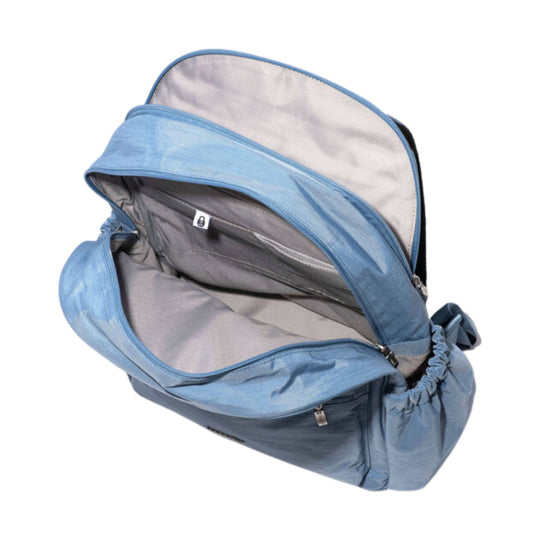 Open light blue backpack with gray interior and multiple zippered compartments