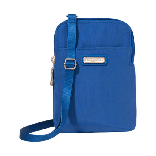 Blue crossbody bag with front pocket, zipper closure, and adjustable shoulder strap