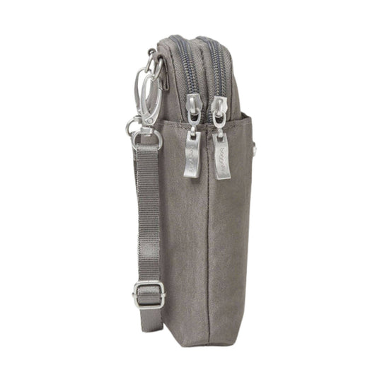 Gray slim crossbody bag with two front zipper pockets, top zippers, and adjustable strap