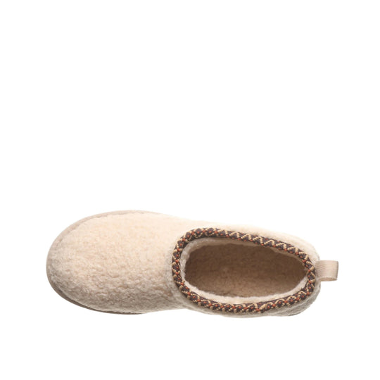 Cream wool clog-style slipper with fuzzy lining and braided trim