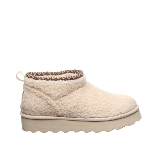 Cream sherpa ankle boot with pull tab and thick platform sole