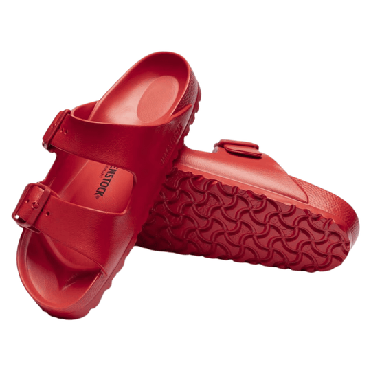 Red molded EVA sandals with adjustable buckle straps and treaded soles