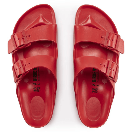 Red two-strap buckle sandals shown from above