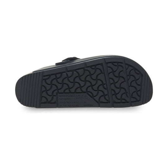 Black clog outsole with wavy tread pattern and molded size markings