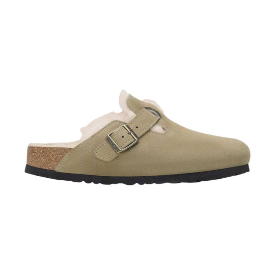 Taupe suede clog with a buckle strap, cork footbed, and black outsole