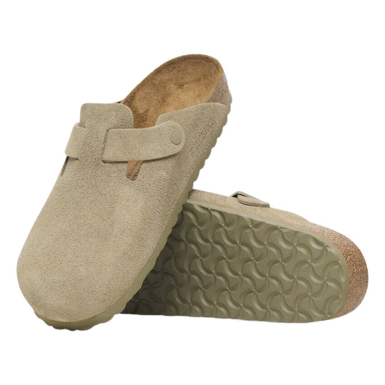 Beige suede clog with adjustable strap and cork footbed, shown with the outsole visible