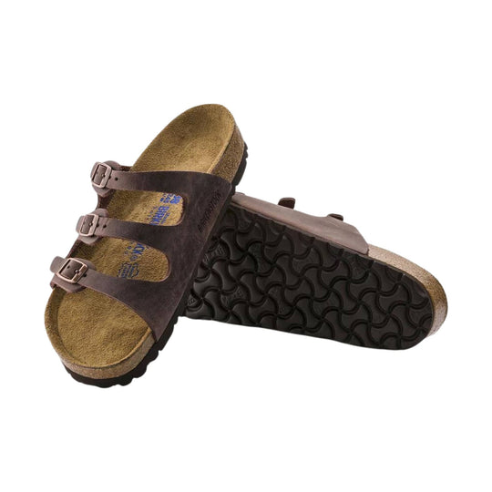 Brown leather three-strap sandal with buckles and cork footbed