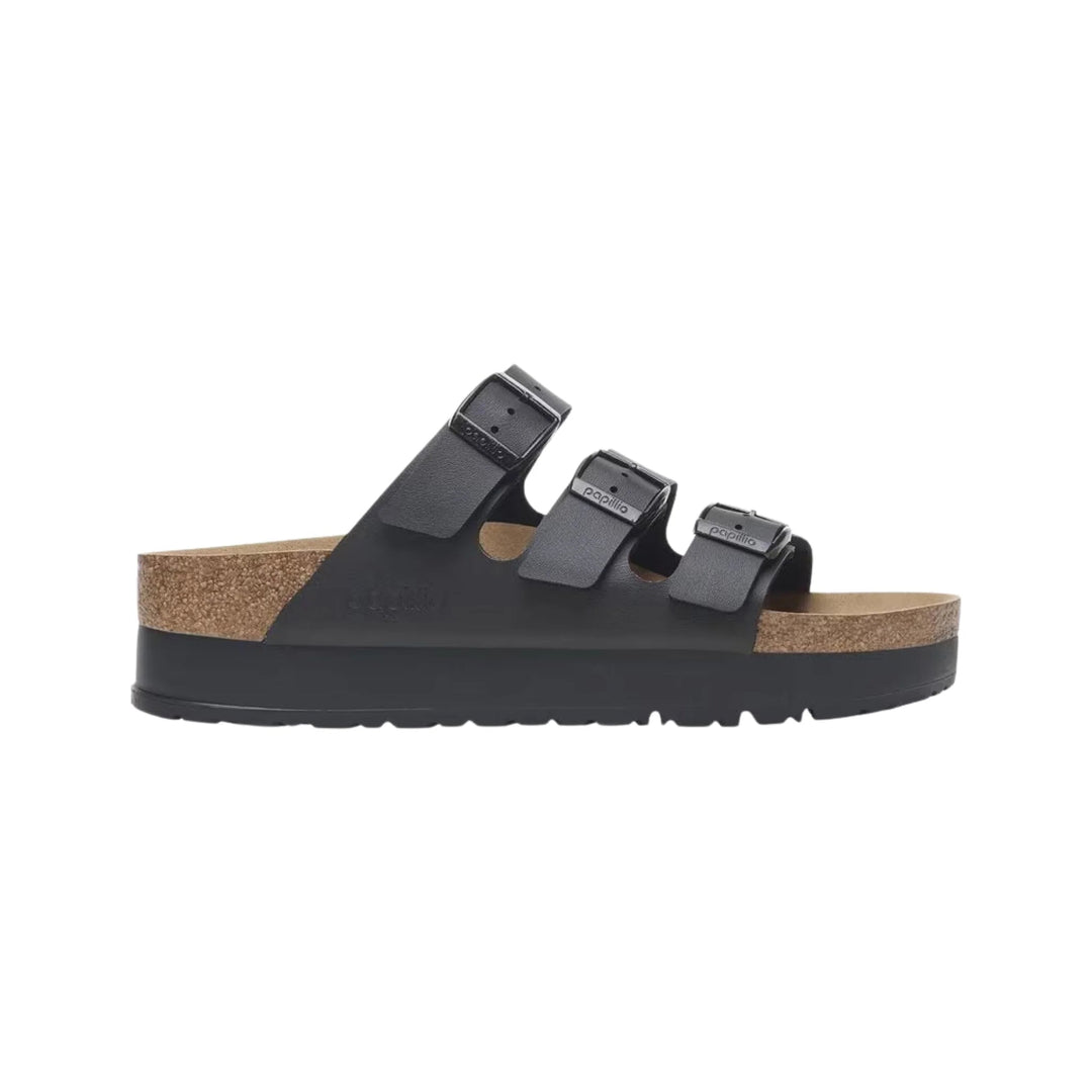 Black three-strap platform sandal with cork side trim and embossed buckle branding