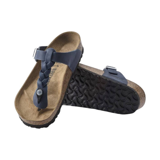 Navy braided thong sandals with cork footbeds and black treaded soles