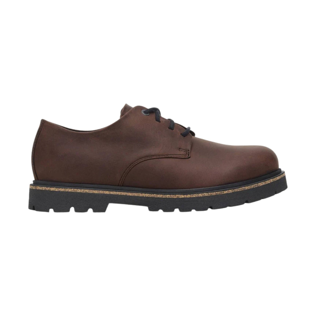 Brown leather lace-up oxford shoe with a black lug sole