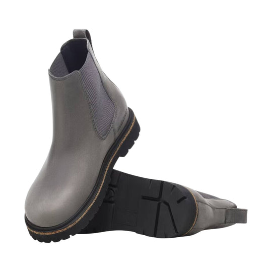 Gray Chelsea-style ankle boot with elastic side panels and lug sole, shown from the side and sole