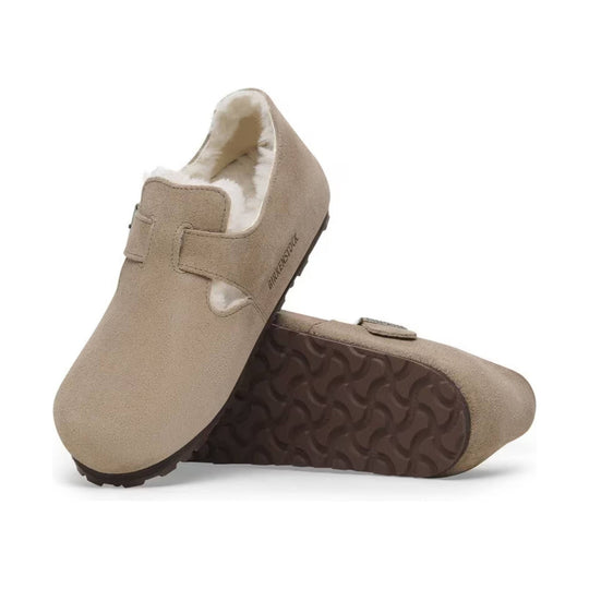 Beige shearling-lined closed-back clog with suede upper and dark tread sole