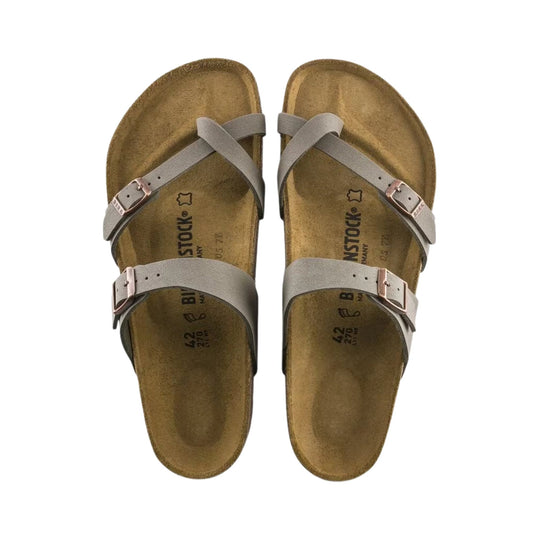 Pair of beige double-strap sandals with rose-gold buckles and cork footbeds, top view