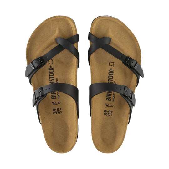 Black strappy cork footbed sandals viewed from above