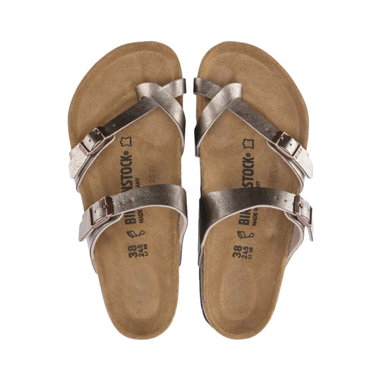Pair of metallic taupe sandal flats with two buckle straps and contoured cork footbeds