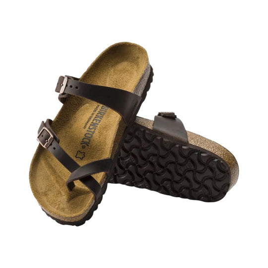 Brown double-strap sandal with buckle closures and a contoured cork footbed