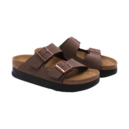 Brown double-strap platform sandals with cork footbeds and black soles