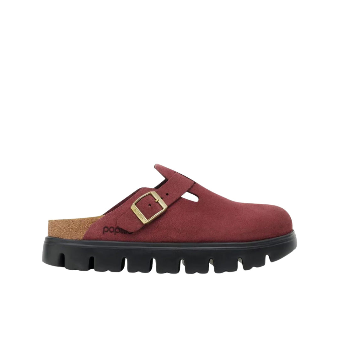 Burgundy clog with a buckle strap, cork footbed, and thick black lug sole