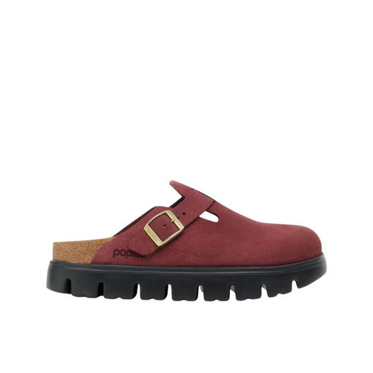 Burgundy clog with a buckle strap, cork footbed, and thick black lug sole