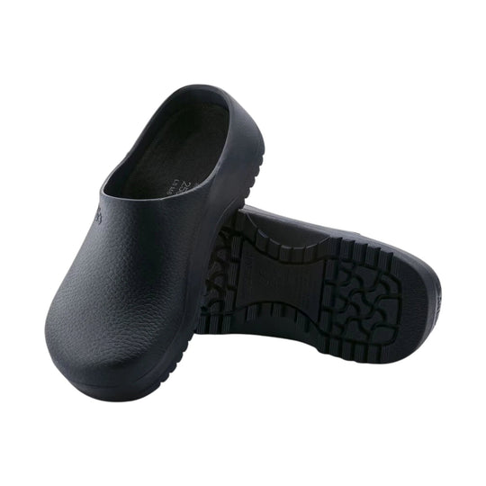 Black slip-on clogs with textured uppers and thick treaded soles