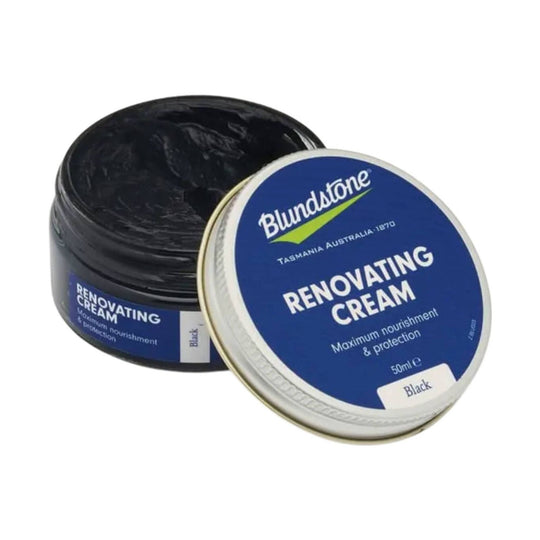 Open tin of black renovating cream with blue lid labeled Renovating Cream and Black