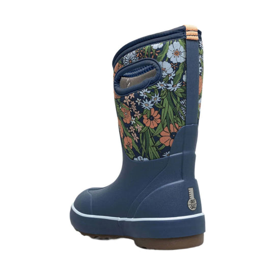 Navy insulated winter boot with floral upper, pull loop, and side temperature rating label