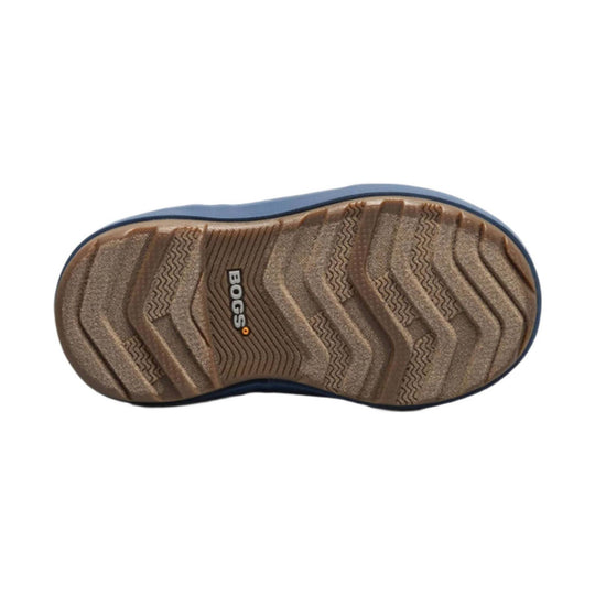 Brown boot sole with textured tread and BOGS logo