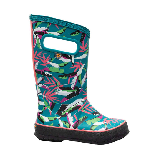 Tall turquoise rain boot with colorful tropical leaf print, black rubber sole, and pull handle