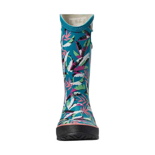 Tall turquoise rain boot with a colorful tropical leaf print and black rubber toe and sole