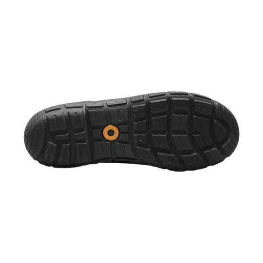 Black lugged shoe sole with orange circular insert
