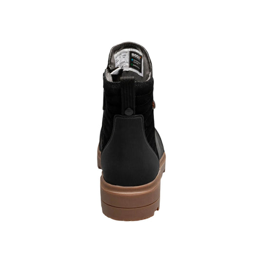 Black ankle boot with brown sole, shown from the back