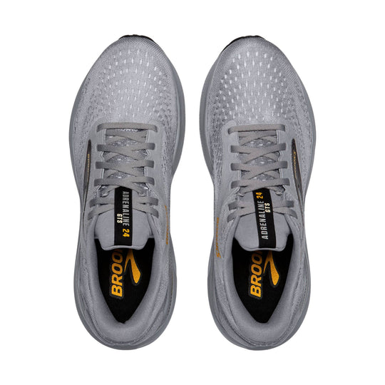 Top view of gray running shoes with mesh uppers, laces, and visible Brooks branding