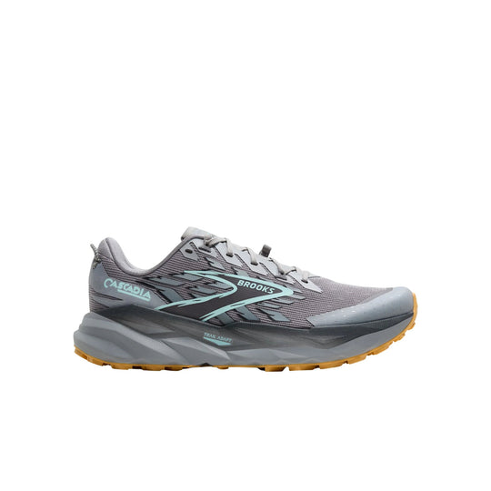 Gray trail running shoe with teal accents, lugged outsole, and side profile view