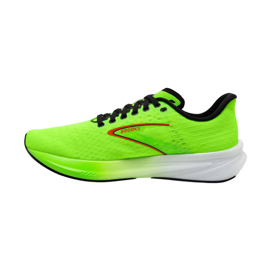 Neon green running shoe with black laces, black collar, and white cushioned sole